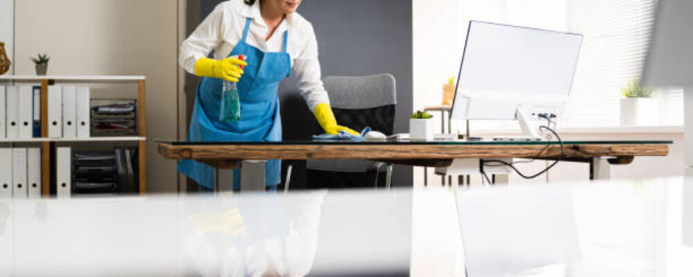 Janitor Cleaning Office Desk. Hygiene Cleaner Service